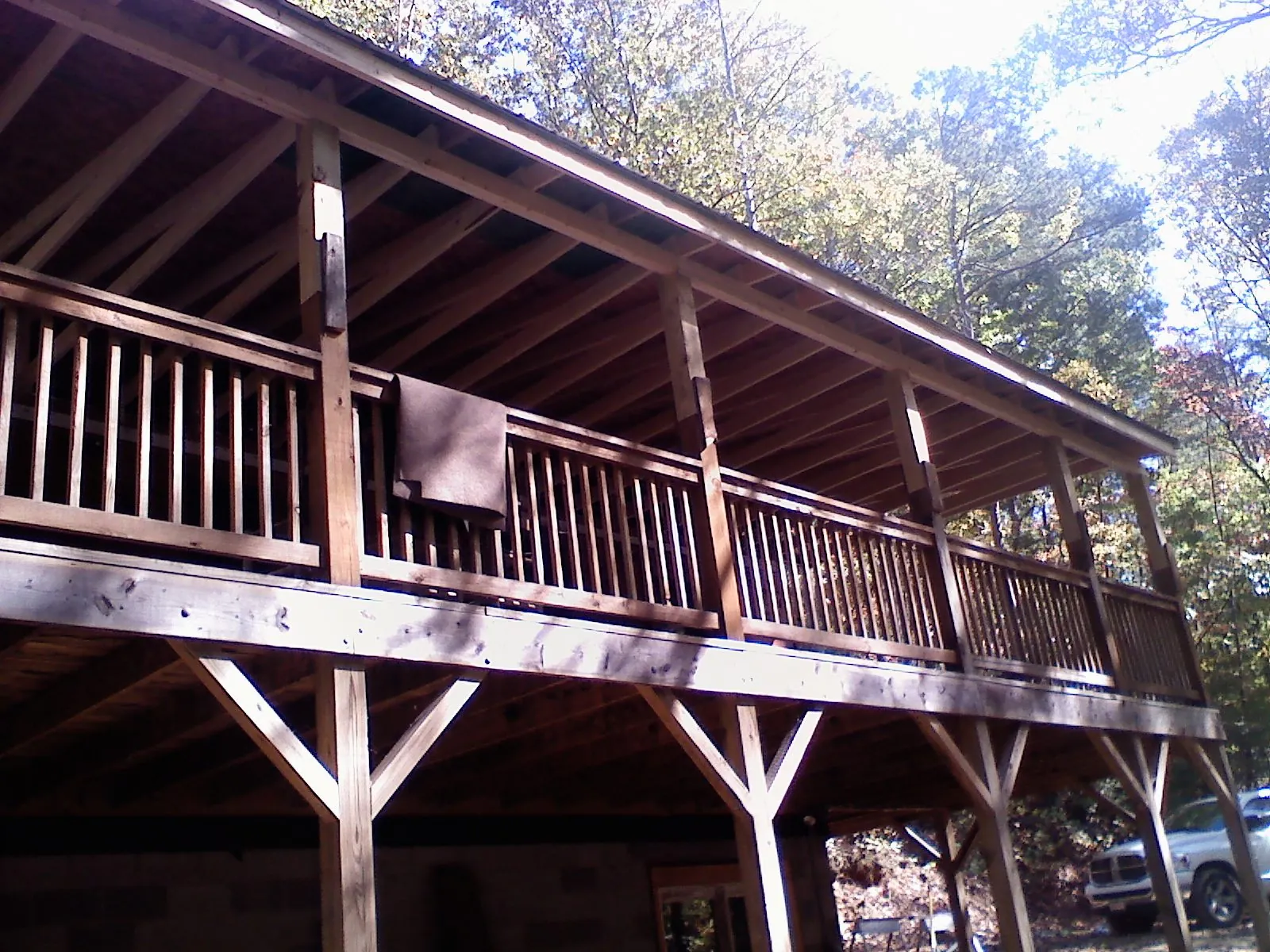 Timber framing under a new elevated porch and deck — Roof Leak Repair in Raynham by Roofing Brothers